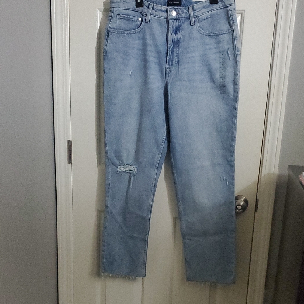 Light Blue Straight Leg Jeans with Subtle Fading